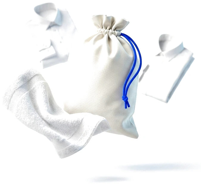 A canvas laundry bag, folded shirts and a towel floating
